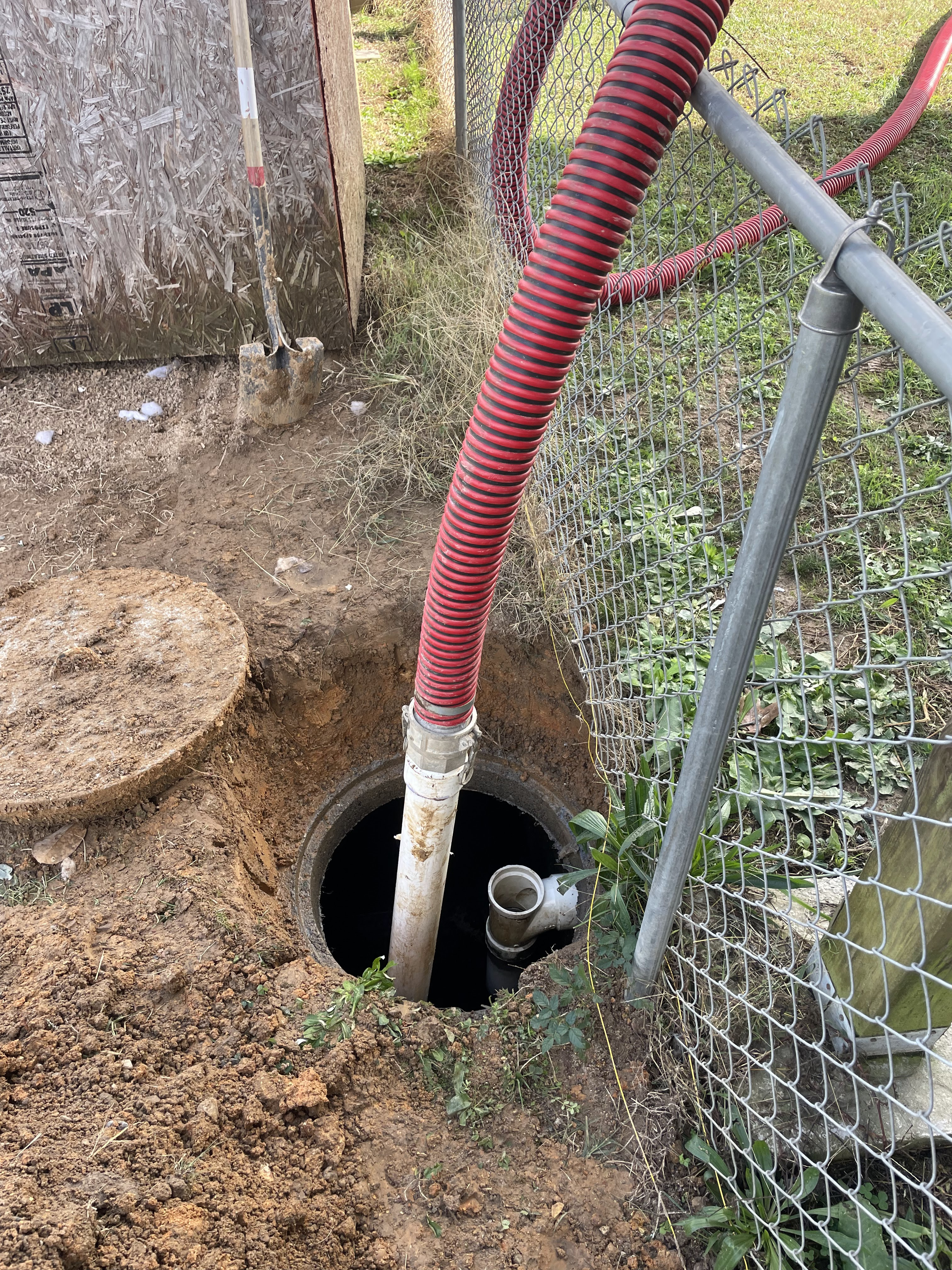 Professional septic draining at a customer's property